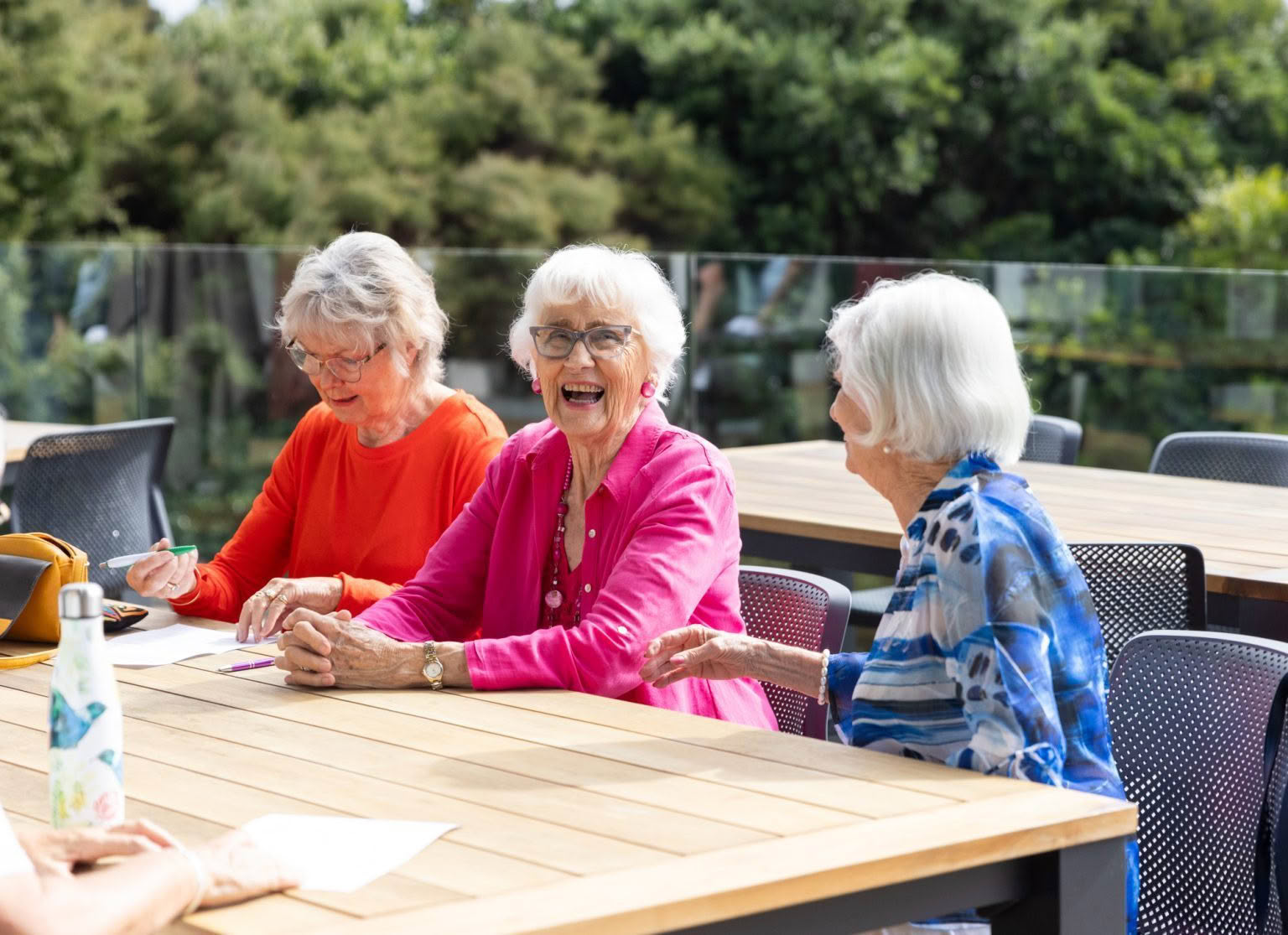 The outdoor deck and BBQ area with estuary views